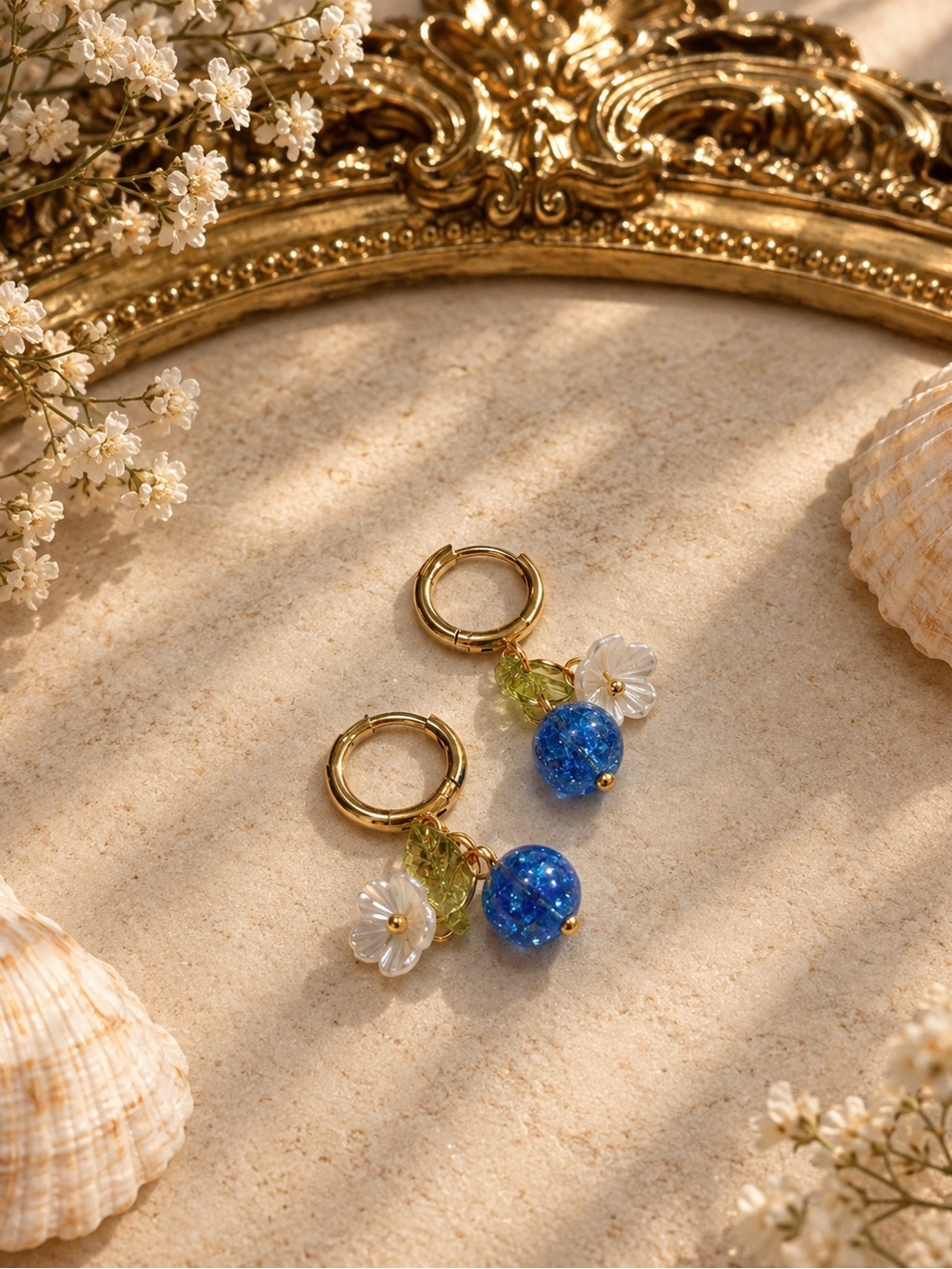 Gold Hoop Earrings with Blue Crystal Beads and White Flower Charms